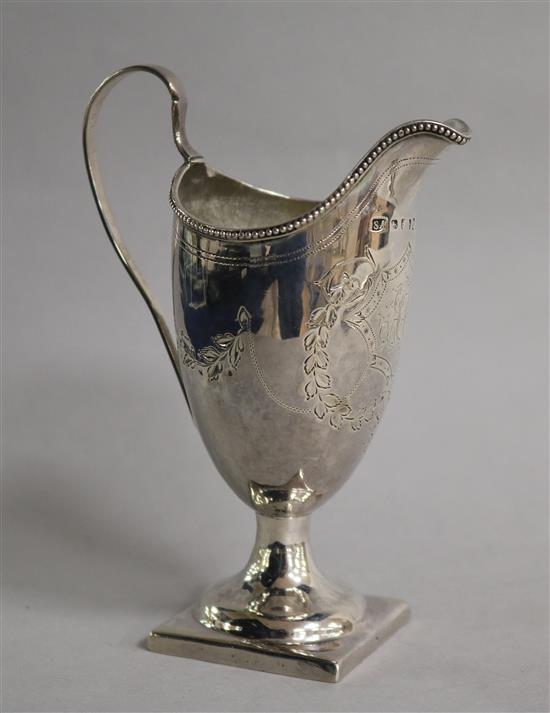 A George III silver helmet cream jug, Stephen Adams I?, London, 1793, 13.2cm.